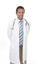 Corporate portrait of serious and confident 40s attractive male medicine doctor with stethoscope on shoulders wearing medical gown Royalty Free Stock Photo