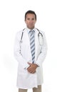 Corporate portrait of serious and confident 40s attractive male medicine doctor with stethoscope Royalty Free Stock Photo