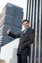 Corporate portrait young attractive businessman outdoors urban office buildings