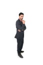 Corporate portrait of young attractive businessman in suit and tie standing thoughtful Royalty Free Stock Photo