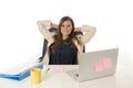 Corporate portrait young attractive businesswoman at office chair working at laptop computer desk Royalty Free Stock Photo