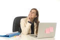 Corporate portrait young attractive businesswoman at office chair working at laptop computer desk Royalty Free Stock Photo