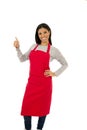 Corporate portrait of young attractive hispanic home cook woman in red apron posing happy and smiling isolated Royalty Free Stock Photo