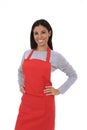 Corporate portrait of young attractive hispanic home cook woman in red apron posing happy and smiling isolated Royalty Free Stock Photo