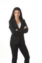 Corporate portrait of young attractive latin businesswoman in office suit smiling happy