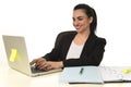 Corporate portrait of young beautiful hispanic woman working happy and relaxed at laptop office Royalty Free Stock Photo