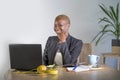 Corporate portrait of young happy and successful black afro American business woman working at modern office smiling cheerful havi Royalty Free Stock Photo