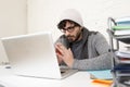 Corporate portrait young hispanic attractive hipster businessman working with computer modern home office Royalty Free Stock Photo