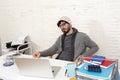 Corporate portrait young hispanic attractive hipster businessman working with computer modern home office Royalty Free Stock Photo