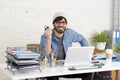 Corporate portrait of young hispanic attractive hipster businessman working at modern home office