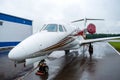 Corporate private jet parked at the airport. Business plane or commercial airplane Royalty Free Stock Photo