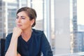 Corporate professional business woman in city office with buildings in background Royalty Free Stock Photo