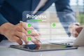 Corporate Progress Tracking with Digital Check Marks. Professional Using Tablet Interface to Monitor Task Completion, Emphasizing