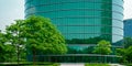 Corporate round building outer view, Eco-friendly building in modern city. Royalty Free Stock Photo