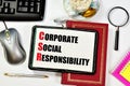 Corporate social responsibility. Text inscription in the research notebook on the textbook.