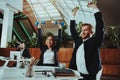 Happy Office Workers Working with Dumbbells Royalty Free Stock Photo