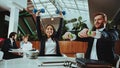 Happy Office Workers Working with Dumbbells Royalty Free Stock Photo