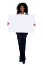 Corporate woman displaying white ad board