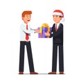 Corporate worker Christmas and New Year congratulations. Business man boss in Santa Claus hat giving holiday gift box