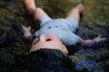 Doll victim in a water Royalty Free Stock Photo