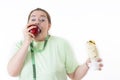 Corpulent Woman Struggling to Eat Healthy Royalty Free Stock Photo