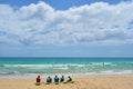 Corralejo beaches. Surfers sitting on the coast. Fuerteventura.