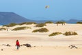 Unknown male kitesurfer on a beach in Corralejo, Fuerteventura, Canary islands, Spain