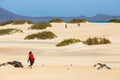 Unknown male kitesurfer on a beach in Corralejo, Fuerteventura, Canary islands, Spain