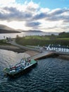 Corran Ferry with The Inn At Ardgour and the Corran Lodge Lighthouse in the background