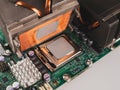 Correct application of thermal conductive paste to the cover of a computer or server circuit before installing the radiator of the