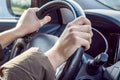 Correct hand position on steering wheel when driving