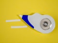 Correction tape on a yellow background. Correction roller. Royalty Free Stock Photo
