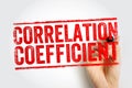 CORRELATION COEFFICIENT written in stamp textured lettering with a hand holding a marker, representing analytics, statistics, math Royalty Free Stock Photo