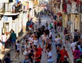 Corrida in the street in Spanish village, men run with bulls