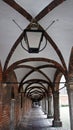 Corridor of arches, old brick tunnel with lanterns, Market Square, Lubeck, Germany
