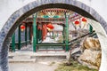 Corridor behind a moon gate in a historic traditional garden during Chinese New Year