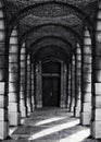 Corridor with columns in black and white selenium photo, abstract architectural photo, black and white photo, architecture details
