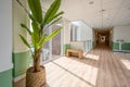 Corridor with doors on both sides. The floor is made of wood and the walls are white Royalty Free Stock Photo