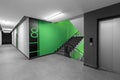 Corridor hall interior, with front door and elevator in many apartment building, with mailboxes with green walls Royalty Free Stock Photo