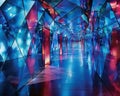 A corridor lined with mirrorlike hexagonal panels reflecting and distorting light creating a surreal hightech pathway Royalty Free Stock Photo