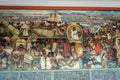 The corridor of National Palace with the famous mural The Grand Tenochtitlan by Diego Rivera - Mexico City, Mexico
