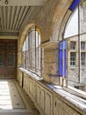 Corridor of a old house with bay windows in the shape of arches Royalty Free Stock Photo