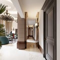 Corridor passage in the living room with brown columns and marble pilasters with doors and sconces on the wall