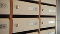 Corridor with postboxes on walls in new residential building. Stock footage. View inside of the entrance of an apartment