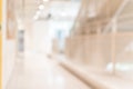 Corridor in school or office building blur background with blurry interior view empty hall way, glass curtain wall and floor Royalty Free Stock Photo