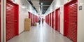 Corridor of self-storage unit with red doors Royalty Free Stock Photo