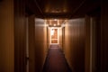 Corridor in a small hotel with brown walls