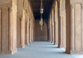 Corridor surrounding the courtyard of the Mosque of Ahmad Ibn Tulun, old Cairo, Egypt Royalty Free Stock Photo