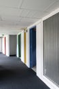 Corridor with urban modern colorful doors at Le Corbusier Masterpiece building Royalty Free Stock Photo
