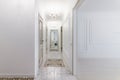 Corridor in with white walls and doors in the apartment Royalty Free Stock Photo